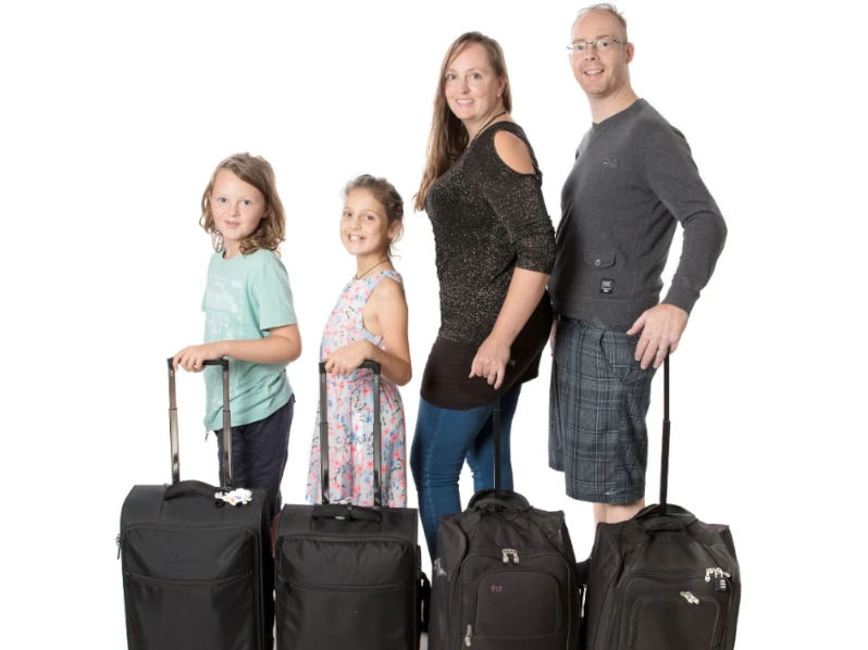 Family with their suitcases